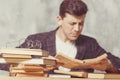 Young boy student sitting near the table with books. blind guy want learning, have education. online education. Study in school. Royalty Free Stock Photo