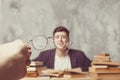 Young boy student sitting near the table with books. blind guy want learning, have education. online education. Study in school. Royalty Free Stock Photo