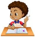 Young boy studying at desk