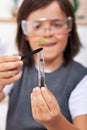 Young boy studying plant evolution in science class Royalty Free Stock Photo