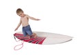 Young boy surfing Royalty Free Stock Photo