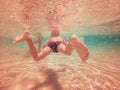 Young boy swimming underwater Royalty Free Stock Photo