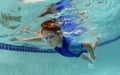 Young boy swimming underwater Royalty Free Stock Photo