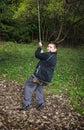 Young boy swing on the rope Royalty Free Stock Photo