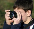 Young boy taking photos Royalty Free Stock Photo