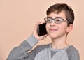 Young boy talking on his smart phone Royalty Free Stock Photo