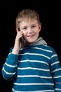 Young boy talking on mobile phone Royalty Free Stock Photo