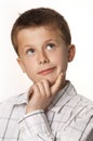 Young boy thinking Royalty Free Stock Photo