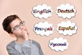 Young boy thinking which languages to learn