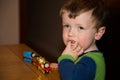 Young boy with toy train Royalty Free Stock Photo