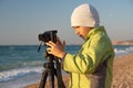 Young boy tries to learn photography Royalty Free Stock Photo