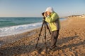 Young boy tries to learn photography Royalty Free Stock Photo