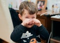 Upset young boy is crying and whining Royalty Free Stock Photo