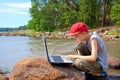 Young boy using a laptop Royalty Free Stock Photo