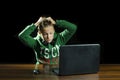 Young boy using a laptop computer