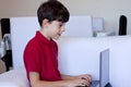 Young Boy Using Laptop Computer Royalty Free Stock Photo