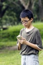 Young boy using mobile phone Royalty Free Stock Photo