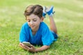 Young boy using mobile phone Royalty Free Stock Photo