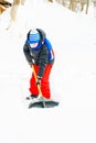 A young boy in the village cleans the snow and makes a walk Royalty Free Stock Photo