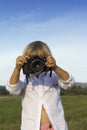 Young boy with vintage photo camera Royalty Free Stock Photo