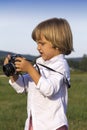 Young boy with vintage photo camera Royalty Free Stock Photo