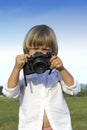 Young boy with vintage photo camera Royalty Free Stock Photo