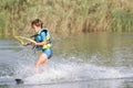 Young boy wakeboarding Royalty Free Stock Photo