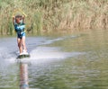 Young boy wakeboarding Royalty Free Stock Photo