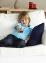 Young Boy Watching Television at Home