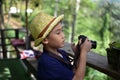 Kids photographer, Thai country boys with digital camera.