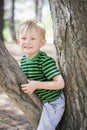 Young boy wearing a fedora at the park