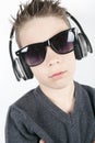 Young boy wearing headphones listening music in Royalty Free Stock Photo