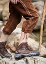 Young boy wearing lederhosen and hiking boots