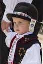 Young boy wearing paloc folk costume in Holloko