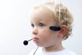 Young boy wearing phone headset IV