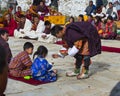 Young Bhutanese boy receives blessings at Puja , Bumthang , central Bhutan