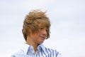 Young boy with windswept hair Royalty Free Stock Photo
