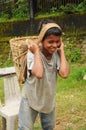 Young Boy works hard as porter, India