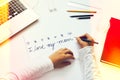 Young boy writes letter to mother Royalty Free Stock Photo