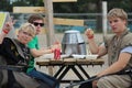 Young Boys Eating at the Medieval Faire in Brooks