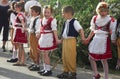 Young boys and girls children, celebrating sping a traditional folk ceremony Maje