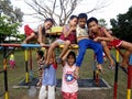 Young boys and girls playing at a playground in Antipolo City, Philippines