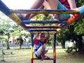 Young boys and girls playing at a playground in Antipolo City, Philippines