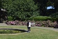 Young Boys Looking at the Fish in a Pond in a Public Park in London