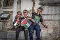 The young boys with Palestine flags at the pro-Palestine rally at Tunis, Tunisia.