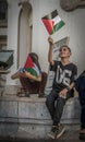 The young boys with Palestine flags at the pro-Palestine rally at Tunis, Tunisia.