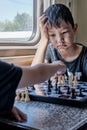 Young boys playing chess