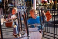 Children on Swings Amusement Park Fair Ride Royalty Free Stock Photo