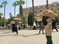 Young boys selling breads in Egyptian bazaar Khan el-Khalili,