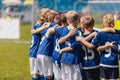 Young Boys of Sports Soccer Club Team Standing Together United. Kids Listening Coach Pre Match Speech